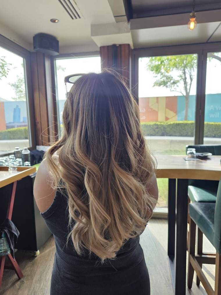 Soft blended blonde lengths, from the salon's own photos