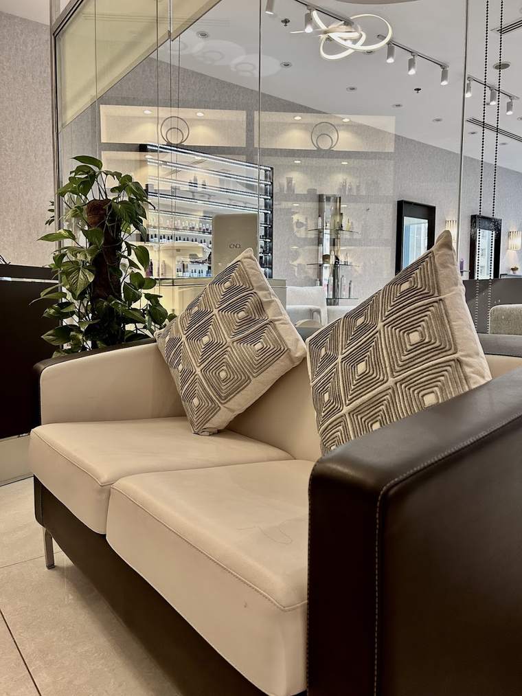 A sofa in the salon's seating area